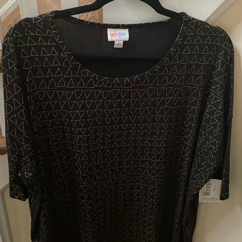 Elegant LuLaRoe Irma top. BNWT. Large. Black and gold!